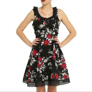 Black dress with red and gray floral design